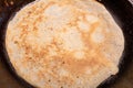 pancake being fried in frying pan Royalty Free Stock Photo