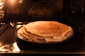 Pancake cake is baked in an oven