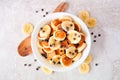 Pancake cereal with bananas and chocolate chips, top view over white marble Royalty Free Stock Photo