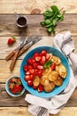 Pancake cereal, mini pancakes with fresh strawberry in a bowl with maple syrup Royalty Free Stock Photo