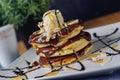 Pancake with chocolate ice-cream on plate Royalty Free Stock Photo