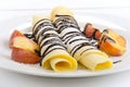 Pancake with chocolate sauce and peach Royalty Free Stock Photo