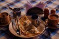 Pancake With cocoa On Table In Asia Cafe.