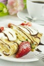 Pancake with coffee and tulip flowers