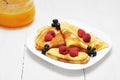 Pancake - Crepes with berries and honey Royalty Free Stock Photo