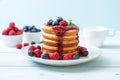 pancake with fresh raspberries and blueberries Royalty Free Stock Photo