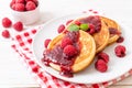 pancake with fresh raspberries and raspberry sauce Royalty Free Stock Photo