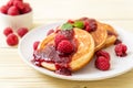 pancake with fresh raspberries and raspberry sauce Royalty Free Stock Photo