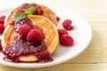 pancake with fresh raspberries and raspberry sauce Royalty Free Stock Photo