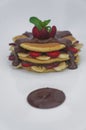 Pancake with fresh strawberry and banana topped on chocolate sauce Royalty Free Stock Photo