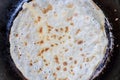 pancake fried in frying pan Royalty Free Stock Photo