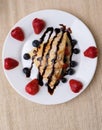Pancake with fruits and chocolate syrup Royalty Free Stock Photo