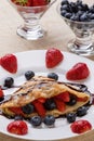 Pancake with fruits and chocolate syrup Royalty Free Stock Photo