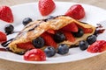 Pancake with fruits and chocolate syrup Royalty Free Stock Photo