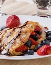 Pancake with fruits and chocolate syrup Royalty Free Stock Photo