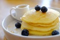 Pancake get served in the morning in the restaurant or the cafe. Food and drink set made by chef and served with hot drink.