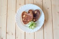Pancake hearts on a wooden background