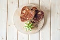 Pancake hearts on a wooden background