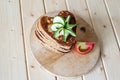 Pancake hearts on a wooden background