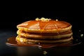 Pancake, a pancake with honey. Black background.