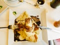 Pancake with ice cream and chocolate sauce Royalty Free Stock Photo