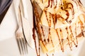 Pancake with ice cream and chocolate sauce Royalty Free Stock Photo