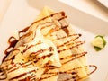 Pancake with ice cream and chocolate sauce Royalty Free Stock Photo