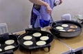 Pancake baking in a kitchen Royalty Free Stock Photo