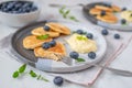 Pancake porridge, mini pancakes in a bowl with maple syrup Royalty Free Stock Photo