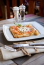 Pancake with salmon and sourcream and dille on a white plate. Royalty Free Stock Photo