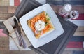 Pancake with salmon and sourcream and dille on a white plate. Royalty Free Stock Photo
