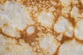 Pancake surface texture and pattern. Close-up of thin hot pancakes in a plate. Traditional rustic food. Graphic resource Royalty Free Stock Photo