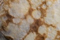 Pancake surface texture and pattern. Close-up of thin hot pancakes in a plate. Traditional rustic food. Graphic resource Royalty Free Stock Photo