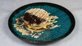 Pancake with a white chocolate toping on a plate Royalty Free Stock Photo