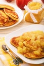 Pancakes with apple jam on white plate. Royalty Free Stock Photo