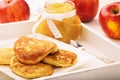 Pancakes with apple jam on white plate. Royalty Free Stock Photo