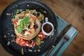 Pancakes with banana, blueberries, strawberries and chocolate sauce Royalty Free Stock Photo