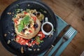 Pancakes with banana, blueberries, strawberries and chocolate sauce Royalty Free Stock Photo