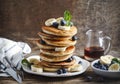 Pancakes with banana, blueberry and maple syrup. Royalty Free Stock Photo