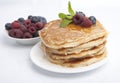 Pancakes with berries, honey and mint