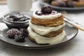 Pancakes with berry and jam. homemade, vegan pancakes with cream and fruit jam