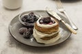 Pancakes with berry and jam. homemade, vegan pancakes with cream and fruit jam