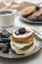 Pancakes with berry and jam. homemade, vegan pancakes with cream and fruit jam