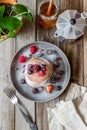 Pancakes with blackberries, raspberries and red currants. American cuisine Royalty Free Stock Photo