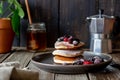 Pancakes with blackberries, raspberries and red currants. American cuisine