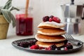 Pancakes with blackberries, raspberries and red currants. American cuisine Royalty Free Stock Photo