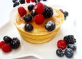 Pancakes with blackberries, blueberries, honey & raspberry