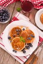 Pancakes with blueberries and chocolate cream. Royalty Free Stock Photo