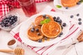 Pancakes with blueberries and chocolate cream. Royalty Free Stock Photo