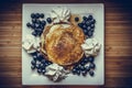 Pancakes with blueberries, cream and maple syrup Royalty Free Stock Photo